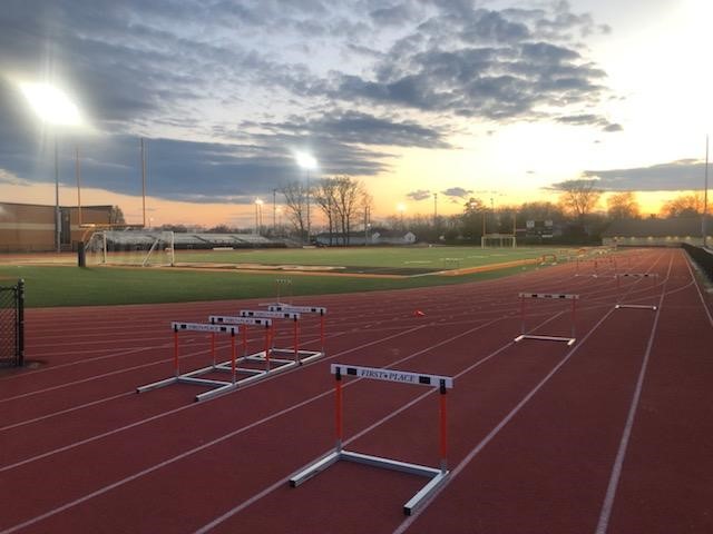 track stadium with lights on